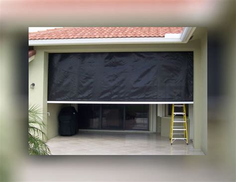 hurricane fabric vs metal shutter|are hurricane screens effective.